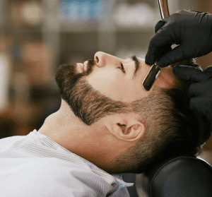 a man getting his hair cut